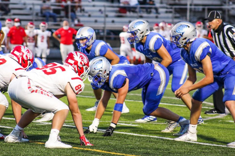 Varsity Football Mudsock Photos