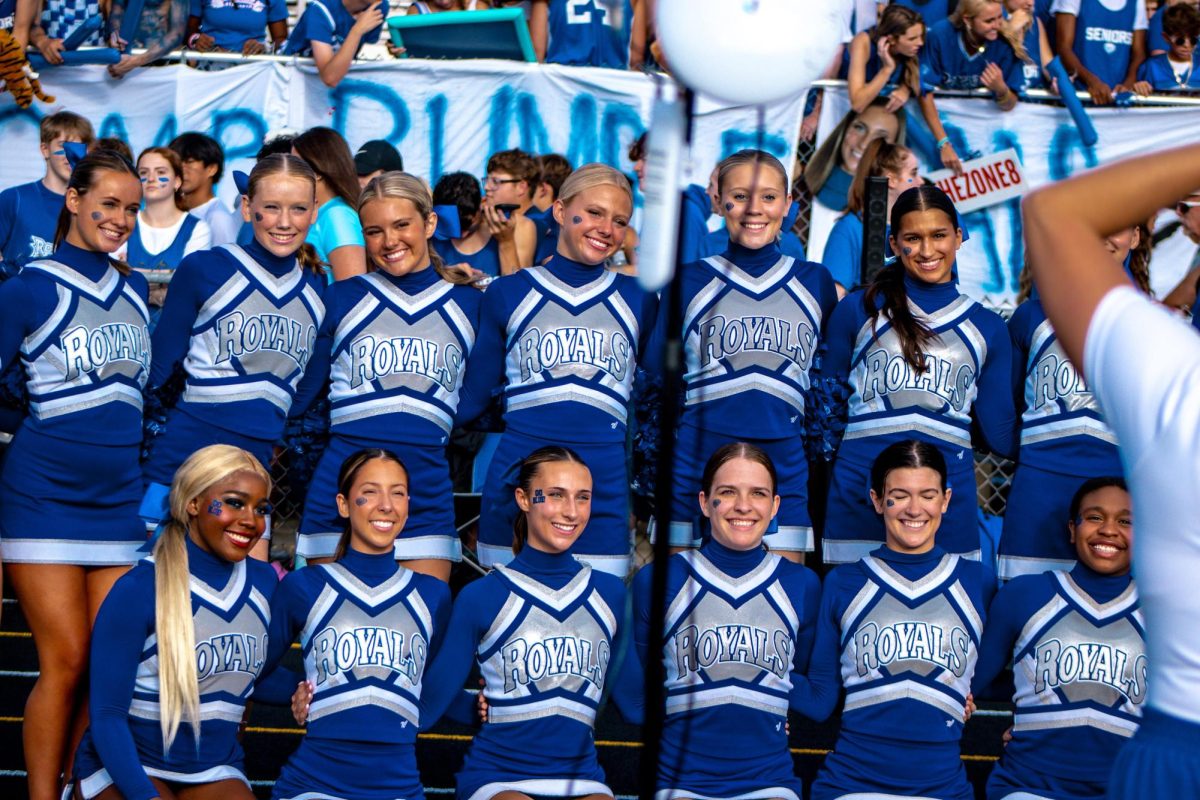 HSE Cheerleaders getting a photo taken.