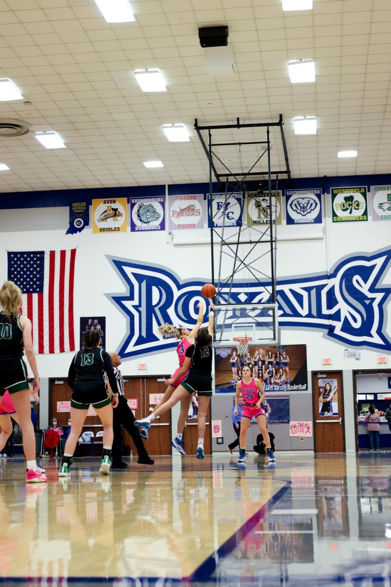 Maya Makalusky goes up for tip off