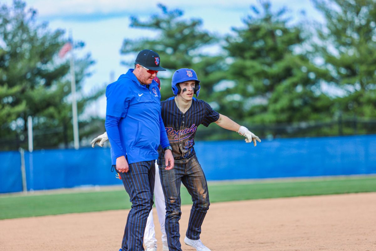 Senior Drew LaFleur doing a celebration after hitting a triple.