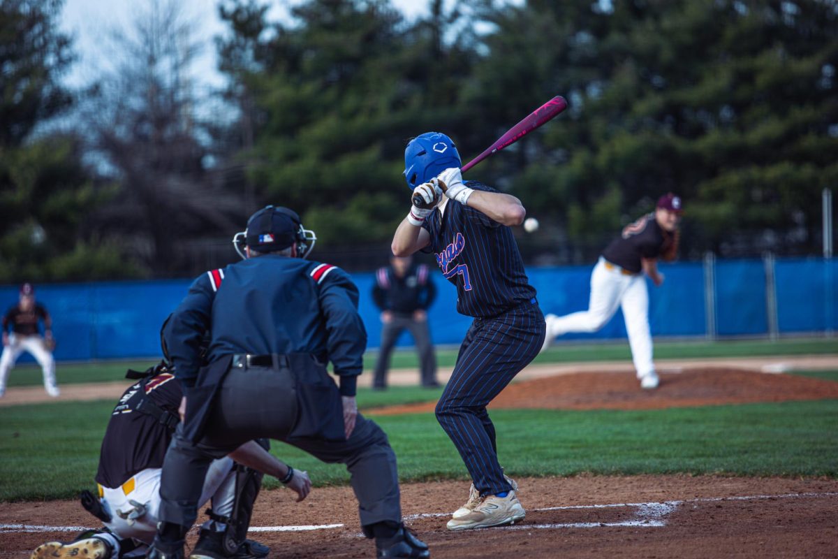 Senior Kam Seitz Taking a at bat 