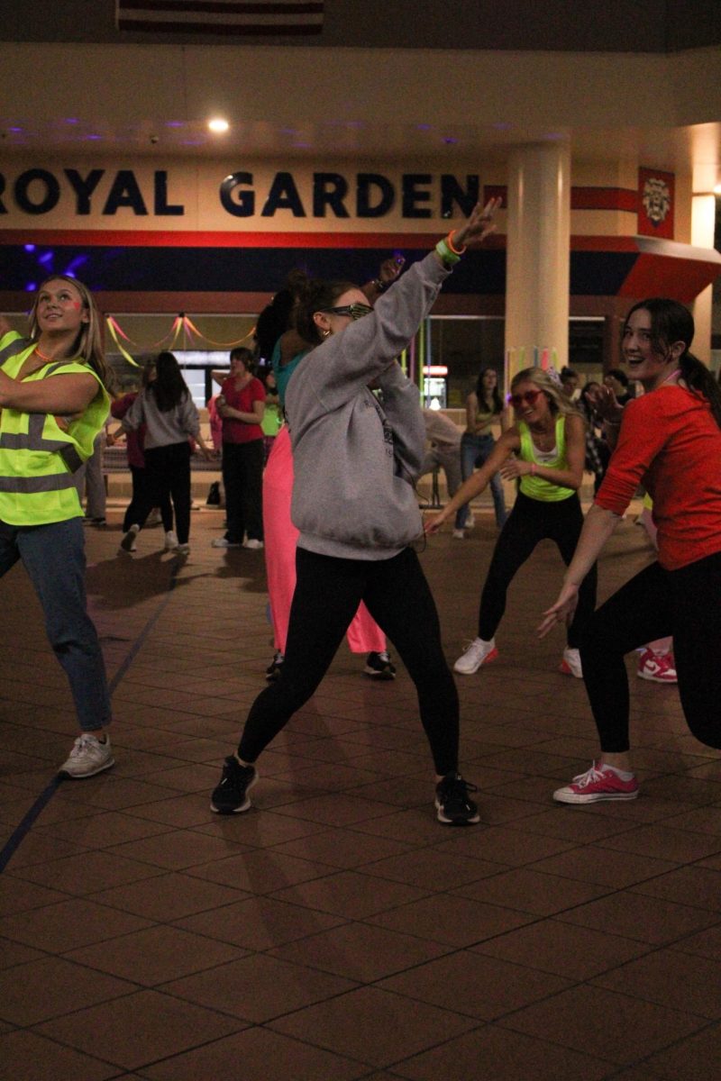 Junior Julia Andres shows off her Just Dance skills with the rest of the crowd.