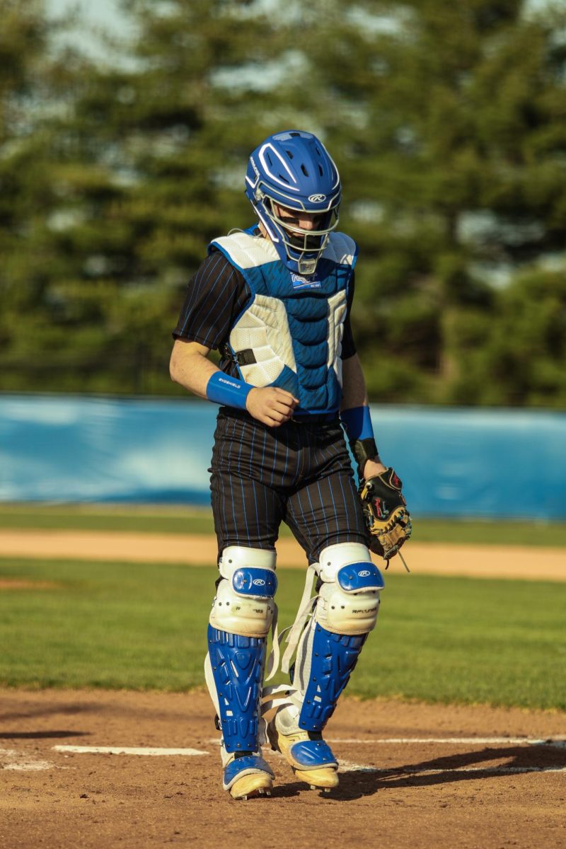 Senior Catcher Alex Billman Walks to the Dugout