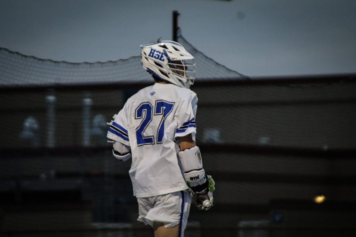 Senior John Pauls grabs the ball out of bounds passing to one of his teammates