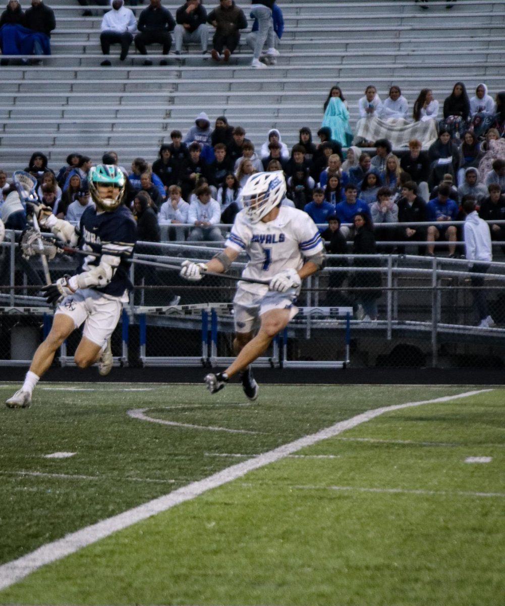 Junior Dillon O'Rourke defends the ball from going in 