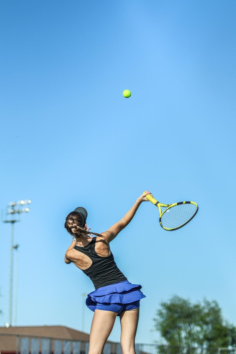 Senior Peighton Baugh Overhead Serving