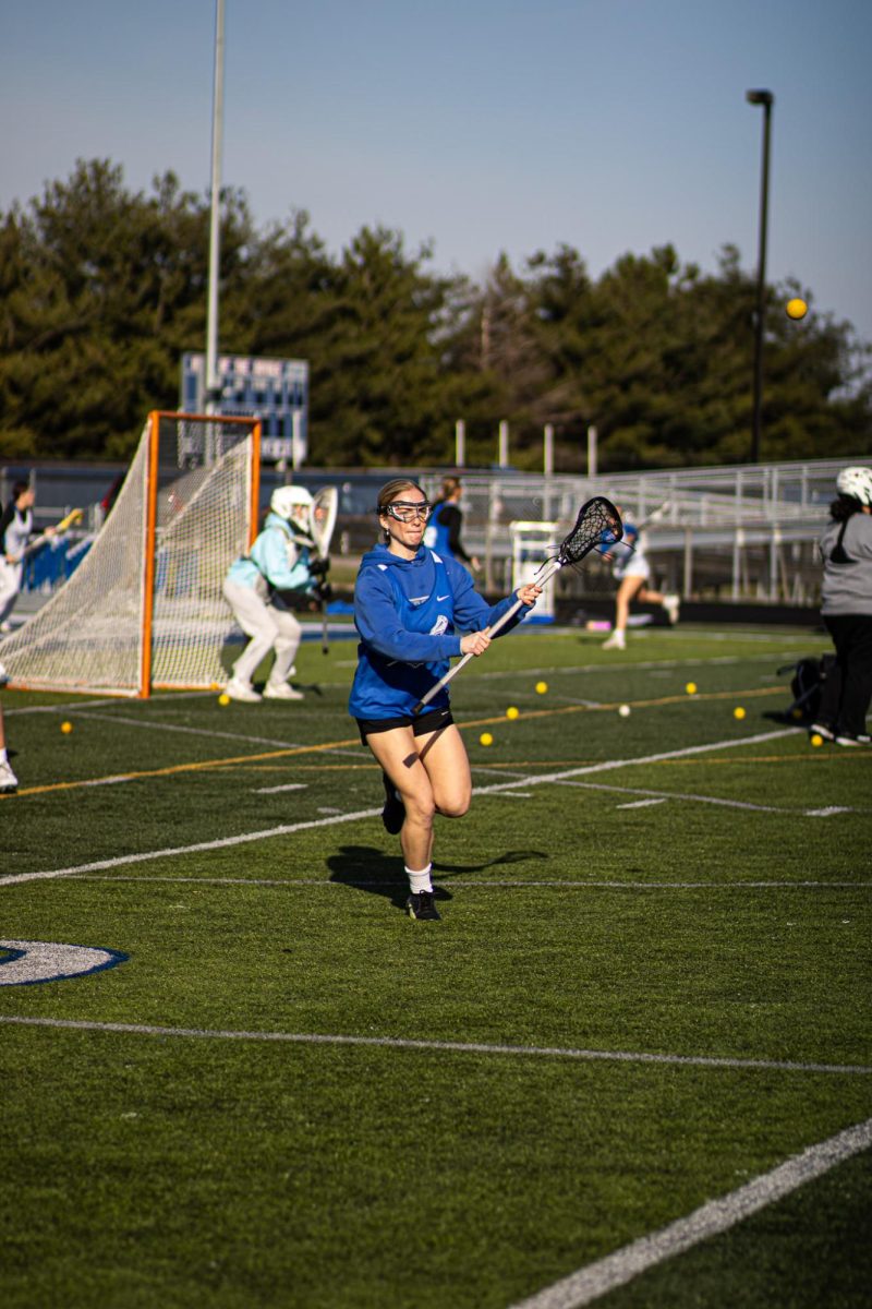 Girls running passing drills