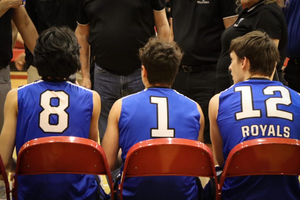 Sean Carmona, Hugo Belmonte, and Colby Jensen sit in the team chat waiting to go back out on the court