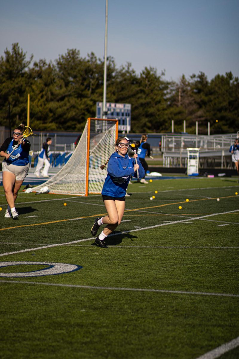 Teammate running passing drills