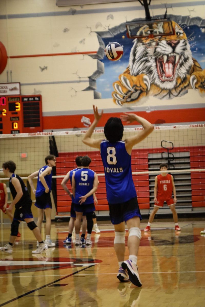 Juinor Sean Carmona serves the ball 