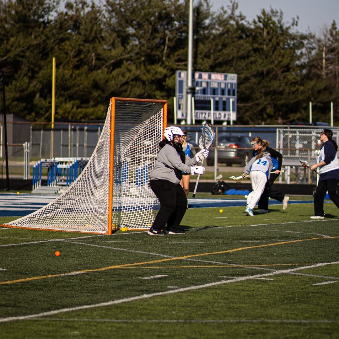 Senior Emma Johnson running blocking drills