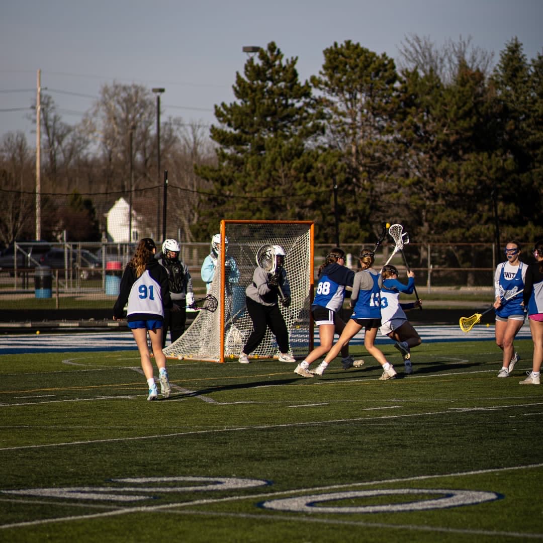 Girls running shooting drills