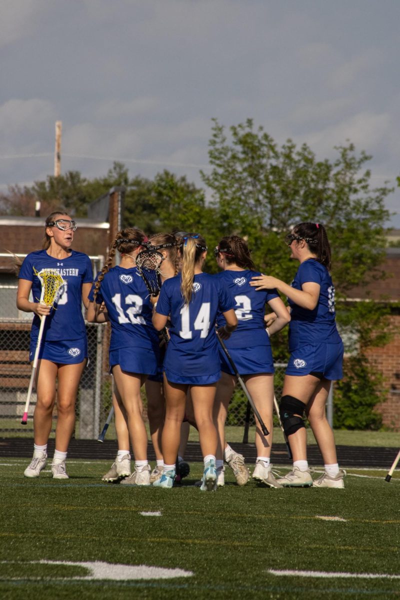 Girls celebrating after a goal against Noblesville 