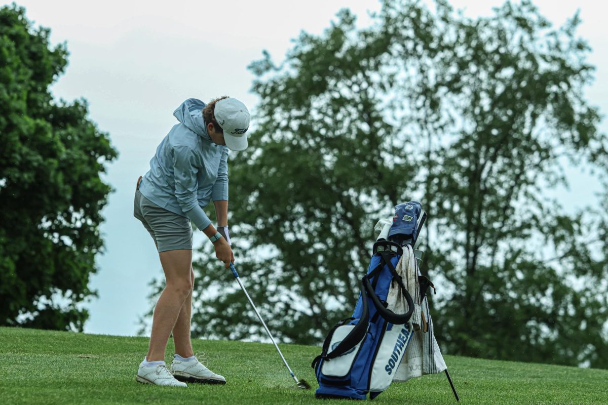 Freshman, Brody Colburn hits the ball uphill at Fall Creek Golf Club on May 9th, 2024