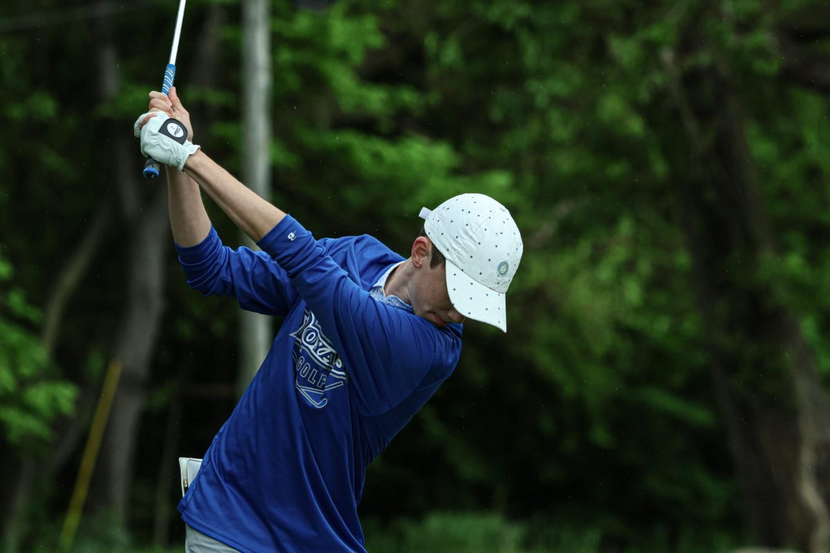 Senior, Aidan Huffer in his backswing at Fall Creek Golf Club on May 9th, 2024