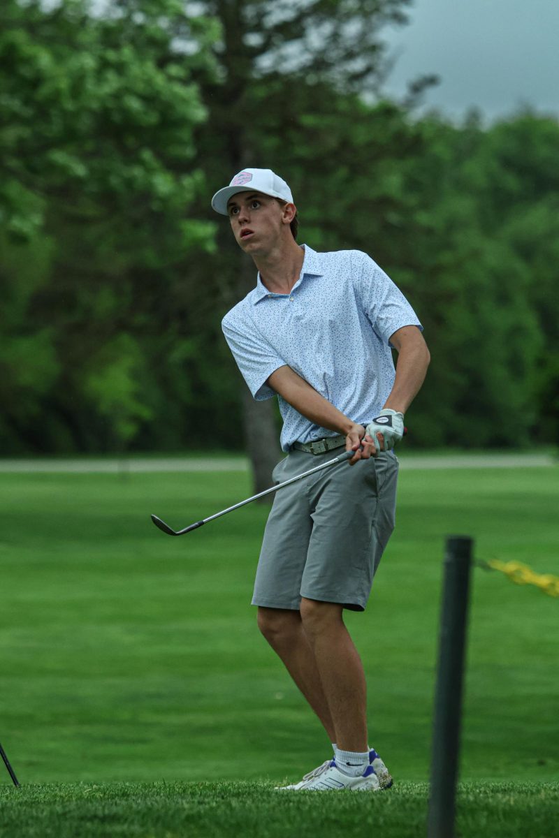 Senior, Nathan Benson Reacts to his swing at Fall Creek Golf Club on May 9th, 2024