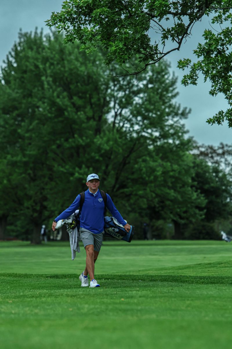 Junior, Kai Warner walks alone at Fall Creek Golf Club on May 9th, 2024