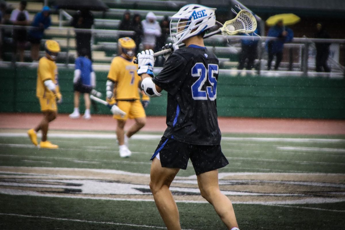 Sophomore Henry Wanz passes the ball to his teammates 